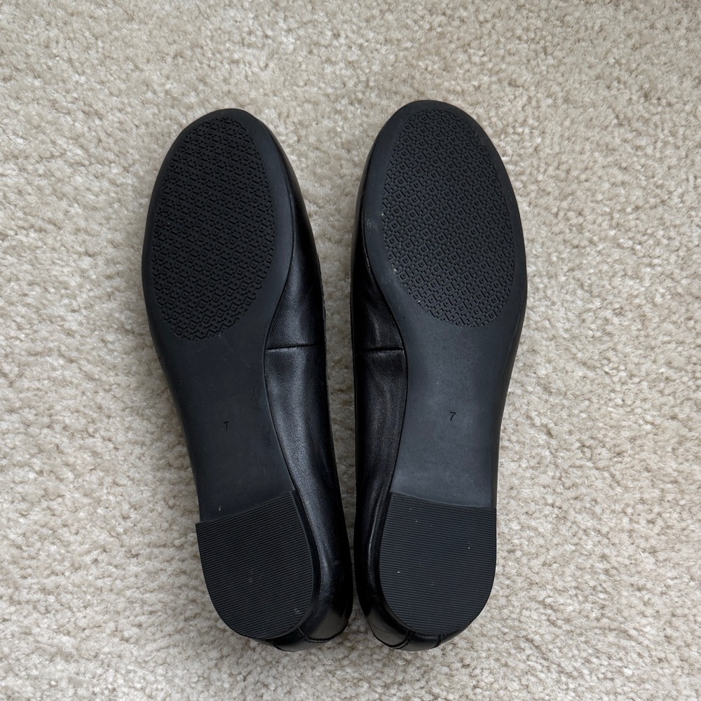 Tory Burch Black Flats with Silver Logo - Picture 2 of 2